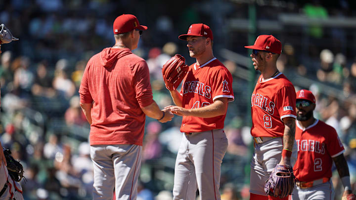 Aug 17, 2025; West Sacramento, California, USA; Los Angeles Angels pitcher Reid Detmers (48) is relieved by  interim manager Ray Montgomery (81) during the eighth inning at Sutter Health Park. Mandatory Credit: Neville E. Guard-Imagn Images