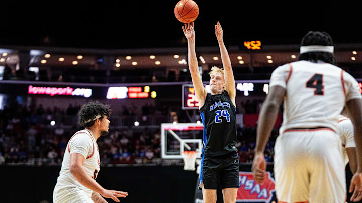 Waukee Northwest's Colin Rice (24) shoots a three against Valley's Marcus McGregor (54) during the 4A state championship on Friday, March 14, 2025, at Wells Fargo Arena.