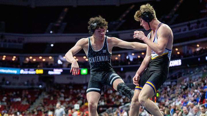 Indianola’s Eli Cox wrestles against Ankeny Centennial’s Maximus Dhabolt at 175 lbs. on Feb. 18, 2026, at Casey’s Center in Des Moines.
