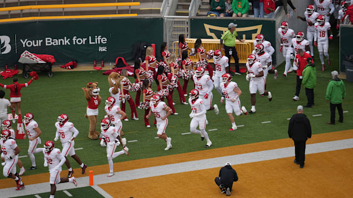 Nov 29, 2025; Waco, Texas, USA;  The Houston Cougars take the field before opening kickoff against the Baylor Bears at McLane Stadium. Mandatory Credit: Chris Jones-Imagn Images