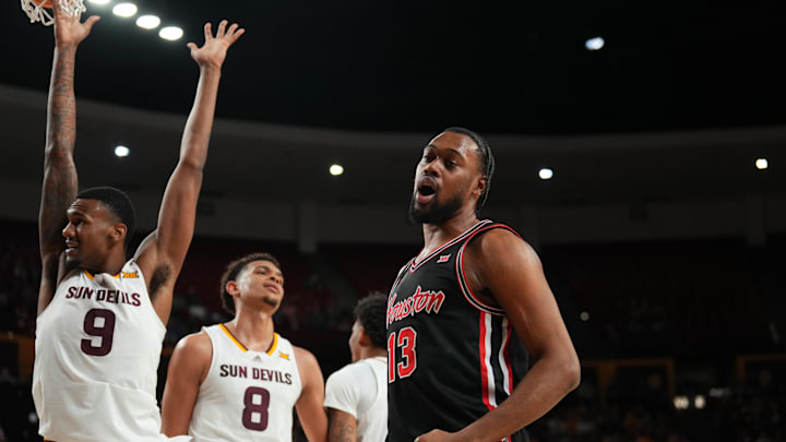 Feb 18, 2025; Tempe, Arizona, USA; Houston Cougars forward J'Wan Roberts (13) celebrates a basket against Arizona State Sun Devils center Shawn Phillips Jr. (9) during the first half at Desert Financial Arena. Mandatory Credit: Joe Camporeale-Imagn Images