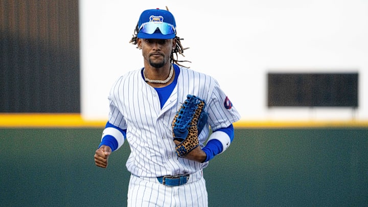 Iowa Cubs' Kevin Alcantara (9) runs to the dugout during opening day against the Omaha Storm Chasers on Friday, March 28, 2025, at Principal Park in Des Moines. Iowa Cubs' Kevin Alcantara (9) runs to the dugout during opening day against the Omaha Storm Chasers on Friday, March 28, 2025, at Principal Park in Des Moines.