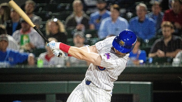 Iowa Cubs' Owen Caissie (17) swings at the ball on Friday, March 28, 2025, at Principal Park in Des Moines.