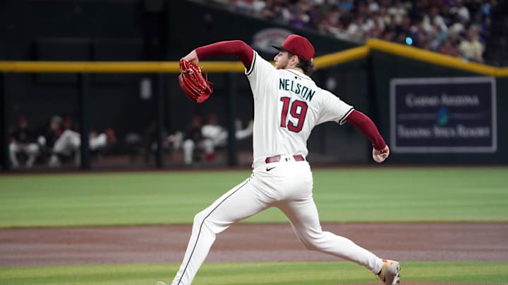 May 26, 2025; Phoenix, Arizona, USA; Arizona Diamondbacks pitcher Ryne Nelson (19) pitches against the Pittsburgh Pirates during the first inning at Chase Field. Mandatory Credit: Joe Camporeale-Imagn Images May 26, 2025; Phoenix, Arizona, USA; Arizona Diamondbacks pitcher Ryne Nelson (19) pitches against the Pittsburgh Pirates during the first inning at Chase Field. Mandatory Credit: Joe Camporeale-Imagn Images