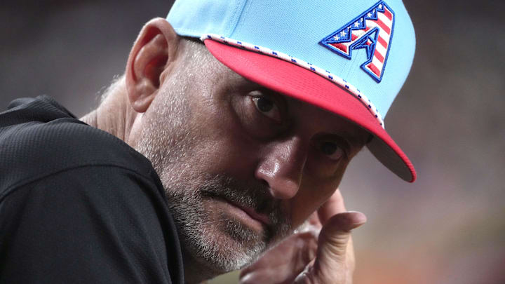 Jul 4, 2025; Phoenix, Arizona, USA; Arizona Diamondbacks manager Torey Lovullo (17) looks on against the Kansas City Royals during the third inning at Chase Field. Mandatory Credit: Joe Camporeale-Imagn Images