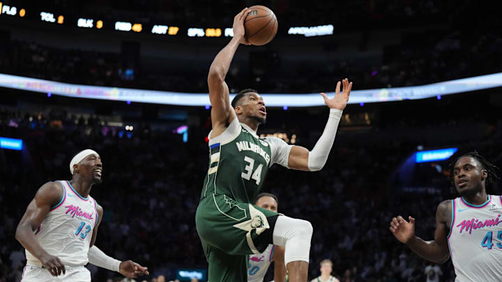 Apr 5, 2025; Miami, Florida, USA; Milwaukee Bucks forward Giannis Antetokounmpo (34) goes up for a dunk in overtime as Miami Heat center Bam Adebayo (13) follows on the play at Kaseya Center. Mandatory Credit: Jim Rassol-Imagn Images Apr 5, 2025; Miami, Florida, USA; Milwaukee Bucks forward Giannis Antetokounmpo (34) goes up for a dunk in overtime as Miami Heat center Bam Adebayo (13) follows on the play at Kaseya Center. Mandatory Credit: Jim Rassol-Imagn Images