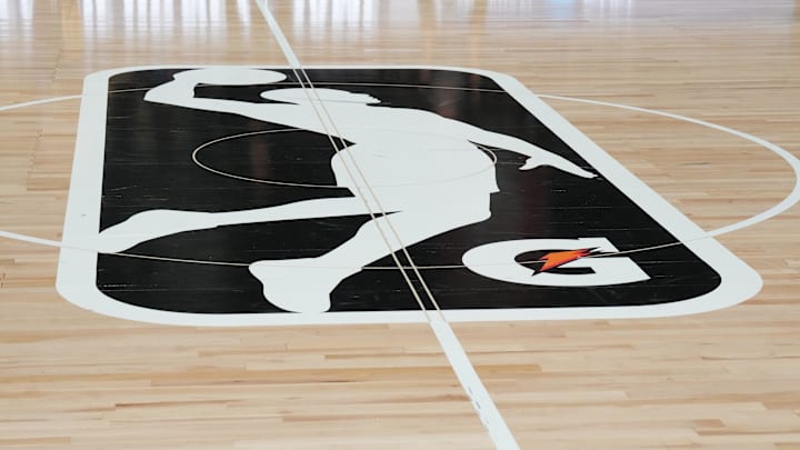 Feb 16, 2025; Oakland, California, USA; The NBA G-League Logo is seen at center court prior to a game at Moscone Center. Mandatory Credit: Darren Yamashita-Imagn Images