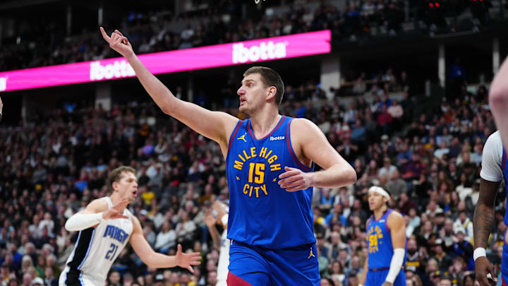 Denver Nuggets center Nikola Jokic (15) calls for a video review in the fourth quarter against the Orlando Magic at Ball Arena. Mandatory Credit: Ron Chenoy-Imagn Images
