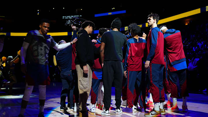Jan 8, 2025; Denver, Colorado, USA; Members of the Denver Nuggets huddle before the game against the LA Clippers at Ball Arena. Mandatory Credit: Ron Chenoy-Imagn Images