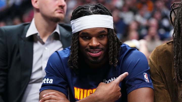 Jan 27, 2026; Denver, Colorado, USA; Denver Nuggets forward Daron Holmes II (14) during the second half against the Detroit Pistons at Ball Arena. Mandatory Credit: Ron Chenoy-Imagn Images Jan 27, 2026; Denver, Colorado, USA; Denver Nuggets forward Daron Holmes II (14) during the second half against the Detroit Pistons at Ball Arena. Mandatory Credit: Ron Chenoy-Imagn Images