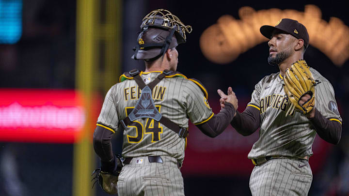 Aug 11, 2025; San Francisco, California, USA; San Diego Padres catcher Freddy Fermin (54) and San Diego Padres pitcher Robert Suarez (75) celebrate after the game against the San Francisco Giants at Oracle Park. Mandatory Credit: Neville E. Guard-Imagn Images