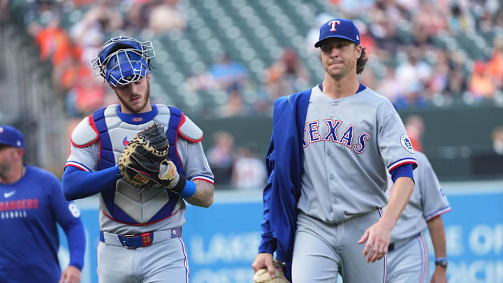 Jun 25, 2025; Baltimore, Maryland, USA; Texas Rangers pitcher Jacob DeGrom (right) and catcher Jonah Heim (left) prior to the game against the Baltimore Orioles at Oriole Park at Camden Yards. 