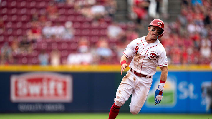 Cincinnati Reds second baseman Matt McLain (9) runs towards third after advancing from first to third on a Cincinnati Reds first baseman Joey Votto (19) base hit in the sixth inning of the MLB baseball game between Cincinnati Reds and Miami Marlins at Great American Ball Park in Cincinnati on Wednesday, Aug. 9, 2023. Cincinnati Reds second baseman Matt McLain (9) runs towards third after advancing from first to third on a Cincinnati Reds first baseman Joey Votto (19) base hit in the sixth inning of the MLB baseball game between Cincinnati Reds and Miami Marlins at Great American Ball Park in Cincinnati on Wednesday, Aug. 9, 2023.