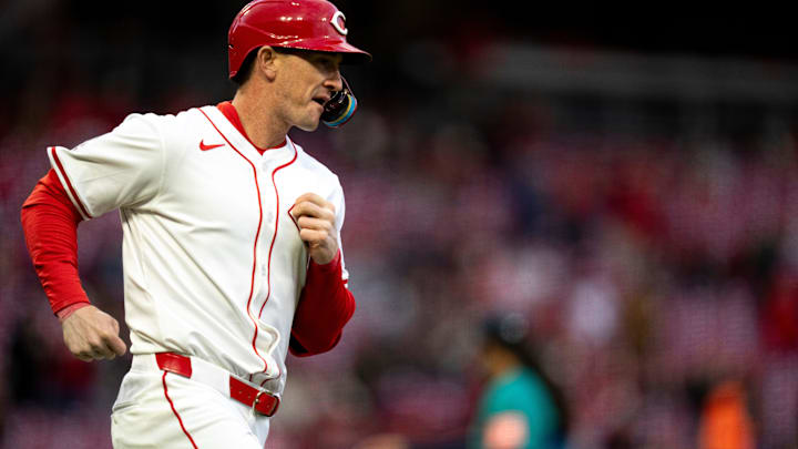Apr 15, 2025; Cincinnati, Ohio, USA;  Cincinnati Reds designated hitter Austin Hays runs to first after hitting an RBI base hit in the third inning of the MLB game between Cincinnati Reds and Seattle Mariners at at Great American Ball Park. Mandatory Credit: Albert Cesare/USA TODAY Network via Imagn Images