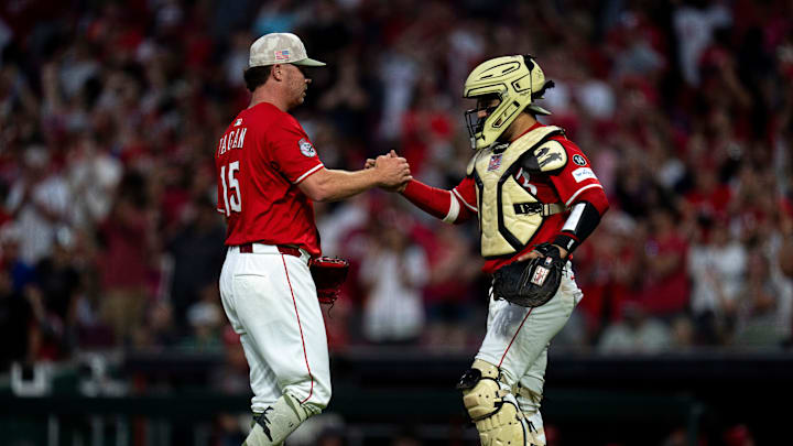 Cincinnati Reds pitcher Emilio Pagán (15) greets Cincinnati Reds catcher Jose Trevino (35) after the MLB game between Cincinnati Reds and Cleveland Guardians at Great American Ball Park in Cincinnati on Saturday, May 17, 2025. Cincinnati Reds pitcher Emilio Pagán (15) greets Cincinnati Reds catcher Jose Trevino (35) after the MLB game between Cincinnati Reds and Cleveland Guardians at Great American Ball Park in Cincinnati on Saturday, May 17, 2025.