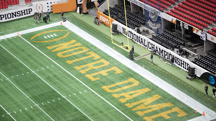 Jan 19, 2025; Atlanta, GA, USA; The Notre Dame Fighting Irish logo in the end zone at Mercedes-Benz Stadium. Mandatory Credit: Kirby Lee-Imagn Images
