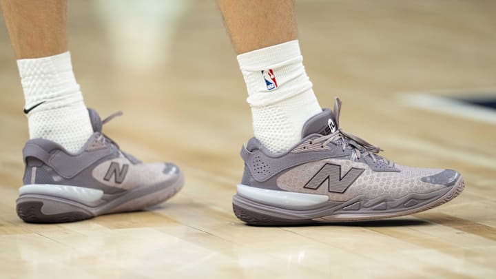 Dallas Mavericks forward Cooper Flagg wears the New Balance Hesi Low v2.