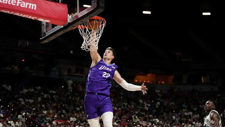 Jul 14, 2025; Las Vegas, NV, USA; Utah Jazz forward Kyle Filipowski (22) dunks the ball against the San Antonio Spurs during the first half of a NBA basketball game at the Thomas & Mack Center. Mandatory Credit: Lucas Peltier-Imagn Images Jul 14, 2025; Las Vegas, NV, USA; Utah Jazz forward Kyle Filipowski (22) dunks the ball against the San Antonio Spurs during the first half of a NBA basketball game at the Thomas & Mack Center. Mandatory Credit: Lucas Peltier-Imagn Images