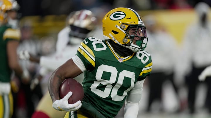 Green Bay Packers wide receiver Bo Melton (80) runs for the five yards during the second quarter of their game against the San Francisco 49ers Sunday, November 24, 2024 at Lambeau Field in Green Bay, Wisconsin.