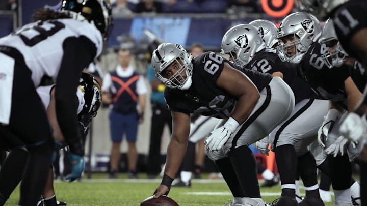 Aug 4, 2022; Canton, Ohio, USA;  Las Vegas Raiders guard Dylan Parham (66) lines up with the Las Vegas Raiders and the Jacksonville Jaguars at the start of a play in the third quarter during the 2022 Hall of Fame game at Tom Benson Hall of Fame Stadium. Mandatory Credit: Kirby Lee-Imagn Images