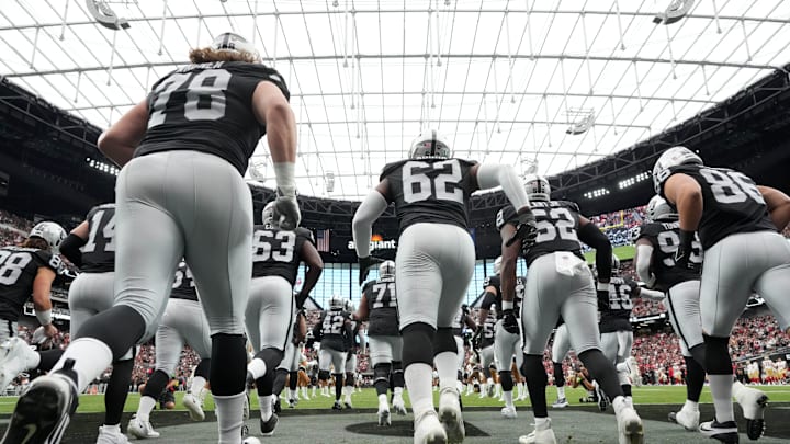 Aug 13, 2023; Paradise, Nevada, USA; A general overall view as Las Vegas Raiders offensive tackle Dalton Wagner (78), defensive end David Agoha (62), defensive end Adam Plant (52) and tight end John Samuel Shenker (86) enter the field before the game against the San Francisco 49ers at Allegiant Stadium. Mandatory Credit: Kirby Lee-Imagn Images Aug 13, 2023; Paradise, Nevada, USA; A general overall view as Las Vegas Raiders offensive tackle Dalton Wagner (78), defensive end David Agoha (62), defensive end Adam Plant (52) and tight end John Samuel Shenker (86) enter the field before the game against the San Francisco 49ers at Allegiant Stadium. Mandatory Credit: Kirby Lee-Imagn Images