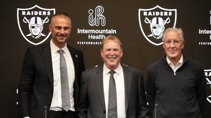 Jan 27, 2025; Las Vegas, NV, USA; Las Vegas Raiders general manager John Spytek (left), owner Mark Davis (center) and coach Pete Carroll pose at press conference at Intermountain Health Performance Center. Mandatory Credit: Kirby Lee-Imagn Images Jan 27, 2025; Las Vegas, NV, USA; Las Vegas Raiders general manager John Spytek (left), owner Mark Davis (center) and coach Pete Carroll pose at press conference at Intermountain Health Performance Center. Mandatory Credit: Kirby Lee-Imagn Images