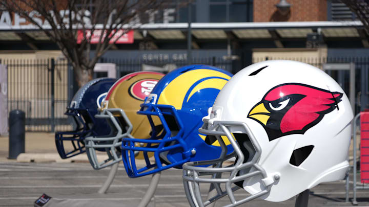 Feb 27, 2025; Indianapolis, IN, USA; NFC West helmets of the Arizona Cardinals, Los Angeles Rams, San Francisco 49ers and Seattle Seahawks at the 2025 NFL Scouting Combine Experience at Lucas Oil Stadium. Mandatory Credit: Kirby Lee-Imagn Images Feb 27, 2025; Indianapolis, IN, USA; NFC West helmets of the Arizona Cardinals, Los Angeles Rams, San Francisco 49ers and Seattle Seahawks at the 2025 NFL Scouting Combine Experience at Lucas Oil Stadium. Mandatory Credit: Kirby Lee-Imagn Images