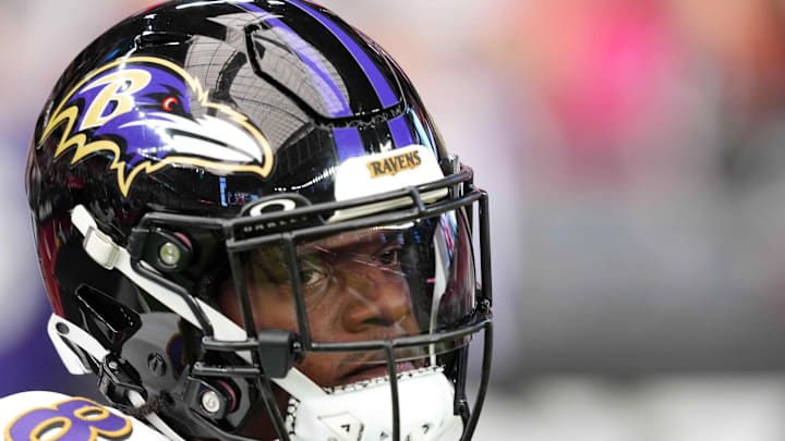 Oct 29, 2023; Glendale, Arizona, USA; Baltimore Ravens quarterback Lamar Jackson (8) warms up prior to facing the Arizona Cardinals at State Farm Stadium. Mandatory Credit: Joe Camporeale-Imagn Images