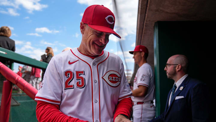 Cincinnati Reds manager David Bell smiles in the dugout ahead of the first pitch of the first inning