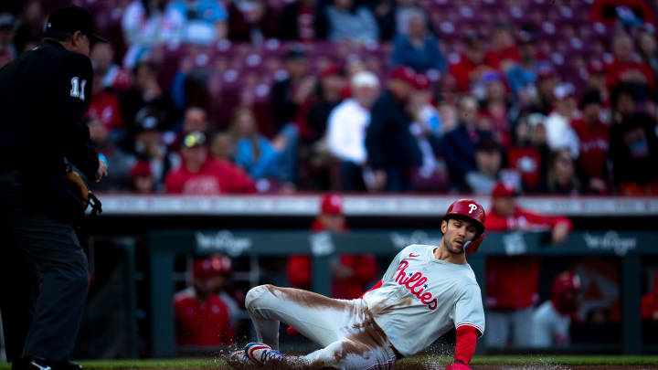 Philadelphia Phillies shortstop Trea Turner (7) scores on a Philadelphia Phillies third base Alec