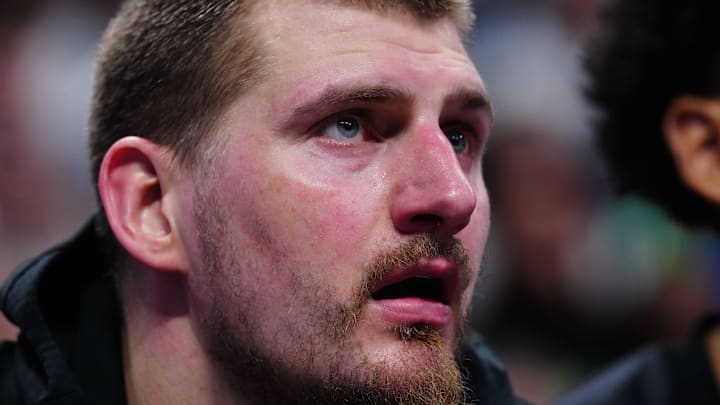 Denver Nuggets center Nikola Jokic on the bench in the third quarter against the Minnesota Timberwolves