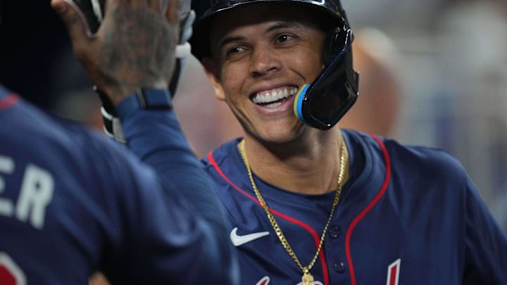 Sep 22, 2024; Miami, Florida, USA;  Atlanta Braves third baseman Gio Urshela (9) celebrates a home run in the sixth inning against the Miami Marlins at loanDepot Park. Mandatory Credit: Jim Rassol-Imagn Images