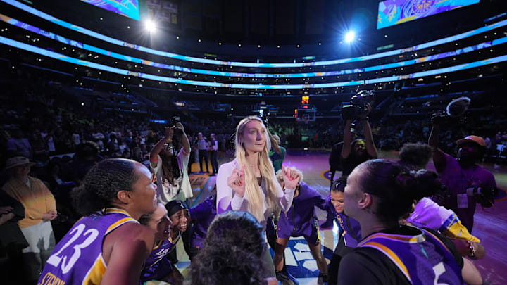 Jul 16, 2024; Los Angeles, California, USA; LA Sparks players huddle around forward Cameron Brink during the game against the Seattle Storm at Crypto.com Arena. Mandatory Credit: Kirby Lee-Imagn Images