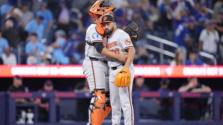 Sep 11, 2026; Toronto, Ontario, CAN;  Baltimore Orioles catcher Samuel Basallo (29) celebrates the win with Baltimore Orioles relief pitcher Rico Garcia (50) against the Toronto Blue Jays at the end of the ninth inning at Rogers Centre.  Mandatory Credit: Nick Turchiaro-Imagn Images