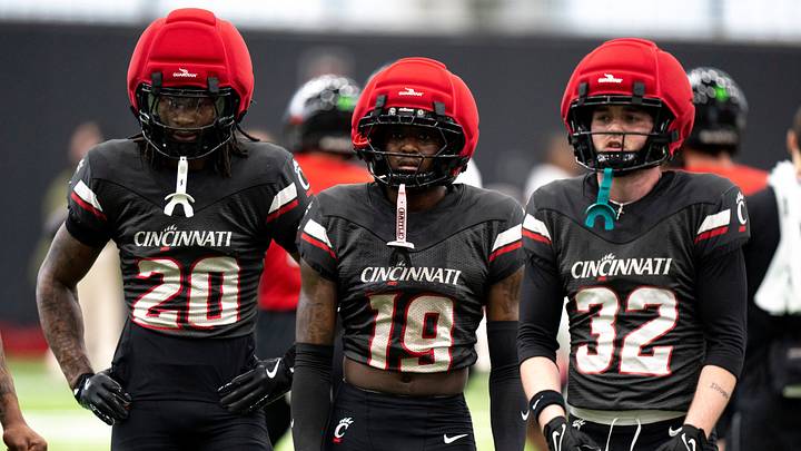 Cincinnati Bearcats linebacker CJ Crite (20), Cincinnati Bearcats safety CJ Jones (19) and Cincinnati Bearcats defensive back Landen Schaefer (32) stand during the Cincinnati Bearcats Spring Showcase in Cincinnati on Saturday, April 18, 2026.