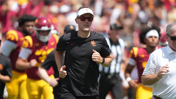 Aug 29, 2026; Los Angeles, California, USA;  USC Trojans head coach Lincoln Riley head coach Lincoln Riley Lincoln Riley Riley enters the field before the game against the San José State Spartans at United Airlines Field at Los Angeles Memorial Coliseum.  Mandatory Credit: Kirby Lee-Imagn Images