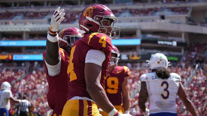 Aug 29, 2026; Los Angeles, California, USA; Southern California Trojans wide receiver Trent Mosley (4) celebrates with running back Waymond Jordan (2) after scoring on a 14-yard touchdown pass in the third quarter against the San Jose State Spartans at United Airlines Field at Los Angeles Memorial Coliseum. Mandatory Credit: Kirby Lee-Imagn Images Aug 29, 2026; Los Angeles, California, USA; Southern California Trojans wide receiver Trent Mosley (4) celebrates with running back Waymond Jordan (2) after scoring on a 14-yard touchdown pass in the third quarter against the San Jose State Spartans at United Airlines Field at Los Angeles Memorial Coliseum. Mandatory Credit: Kirby Lee-Imagn Images