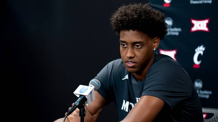 Cincinnati Bearcats forward Baba Miller speaks at a podium at First Third Arena in Cincinnati on Wednesday, July 16, 2025. Cincinnati Bearcats forward Baba Miller speaks at a podium at First Third Arena in Cincinnati on Wednesday, July 16, 2025.