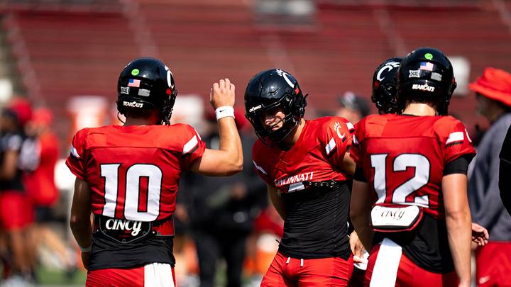 Cincinnati Bearcats Quarterback Liam O'Brien (10) high fives Cincinnati Bearcats JC French IV (4) during the Cincinnati Bearcats football practice at Nippert Stadium in Cincinnati on Saturday, Aug. 8, 2026. Cincinnati Bearcats Quarterback Liam O'Brien (10) high fives Cincinnati Bearcats JC French IV (4) during the Cincinnati Bearcats football practice at Nippert Stadium in Cincinnati on Saturday, Aug. 8, 2026.