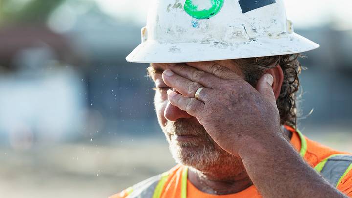 Face of a serious construction worker
