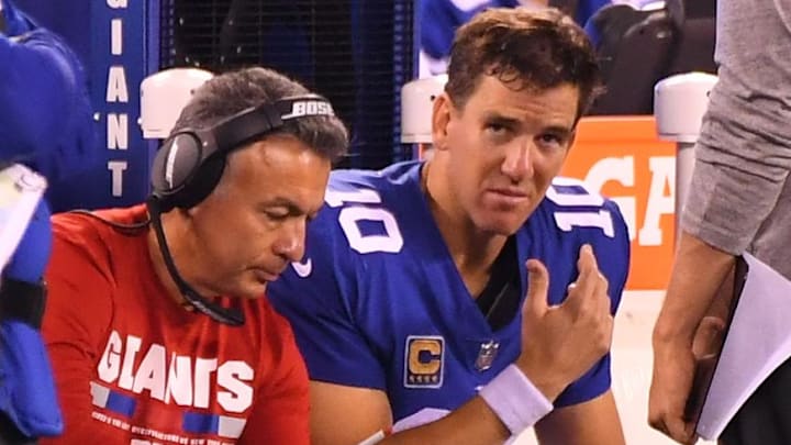Sep 18, 2017; East Rutherford, NJ, USA; New York Giants quarterback Eli Manning (10) with the offensive coordinator Mike Sullivan late in the 4th quarter against the Detroit Lions  during a NFL football game at MetLife Stadium. Mandatory Credit: Robert Deutsch-Imagn Images