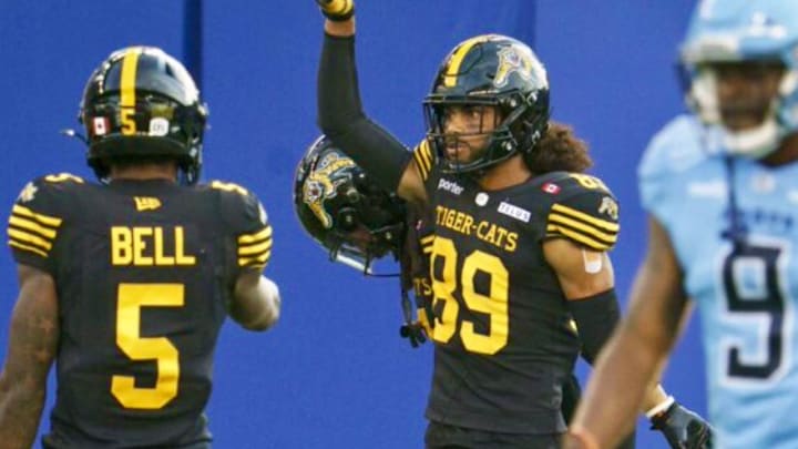 Former Cal star Kenny Lawler celebrates a touchdown in the CFL Former Cal star Kenny Lawler celebrates a touchdown in the CFL