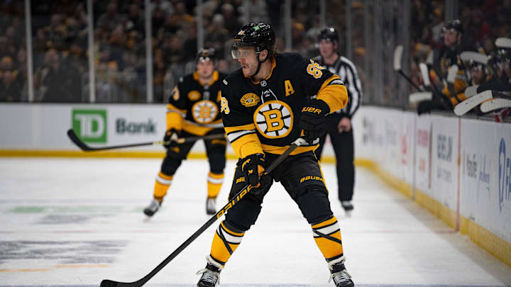 Dec 1, 2024; Boston, Massachusetts, USA; Boston Bruins right wing David Pastrnak (88) skates with the puck in the third period of a game against the Montreal Canadiens at TD Garden. Mandatory Credit: Natalie Reid-Imagn Images