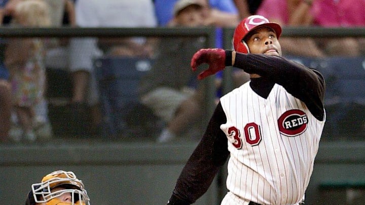 JULY 1, 2001: Ken Griffey, Jr., along with Tigers catcher Robert Fick, watches a huge solo home run