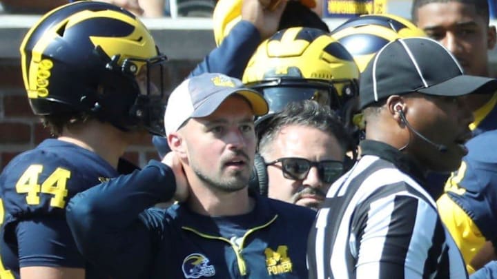 Michigan football analyst Connor Stalions stands on the sideline during the team's game against Rutgers, Sept. 23, 2023 at Michigan Stadium in Ann Arbor.