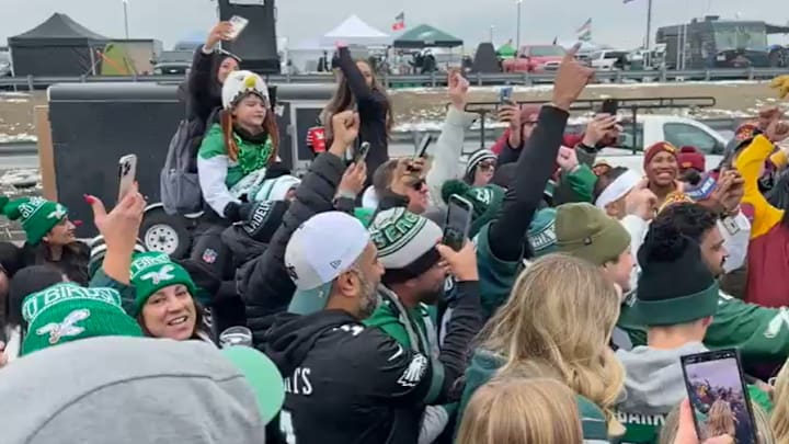 Fans of the Philadelphia Eagles and Washington Commanders tailgate before the 2025 NFC Championship Game.
