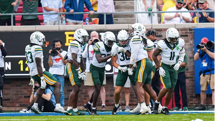 Safety Jacob Redding celebrating with teammates after his interception vs. SMU Safety Jacob Redding celebrating with teammates after his interception vs. SMU