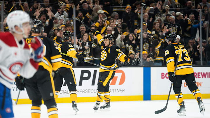 Dec 1, 2024; Boston, Massachusetts, USA;  Boston Bruins right wing David Pastrnak (88) scores on the Montreal Canadiens during the first period of a game at the TD Garden. Mandatory Credit: Natalie Reid-Imagn Images