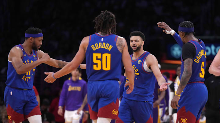 May 20, 2023; Los Angeles, California, USA; Denver Nuggets guard Jamal Murray (27) celebrates with forward Bruce Brown (11), forward Aaron Gordon (50) and guard Kentavious Caldwell-Pope (5) during game three of the Western Conference Finals for the 2023 NBA playoffs against the Los Angeles Lakers at Crypto.com Arena. Mandatory Credit: Kirby Lee-Imagn Images