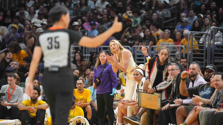 Jul 7, 2024; Los Angeles, California, USA; LA Sparks injured forward Cameron Brink watches from the bench against the Phoenix Mercury in the second half at Crypto.com Arena. Mandatory Credit: Kirby Lee-Imagn Images